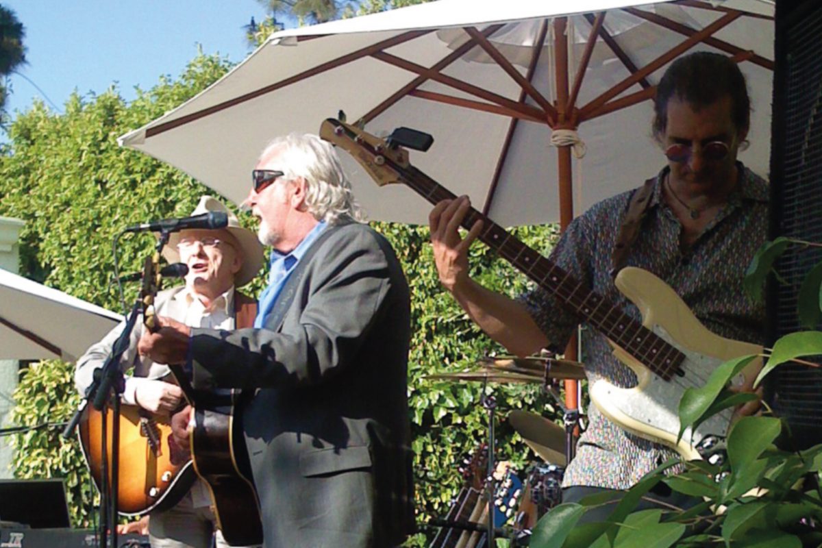 Band plays at a garden party.