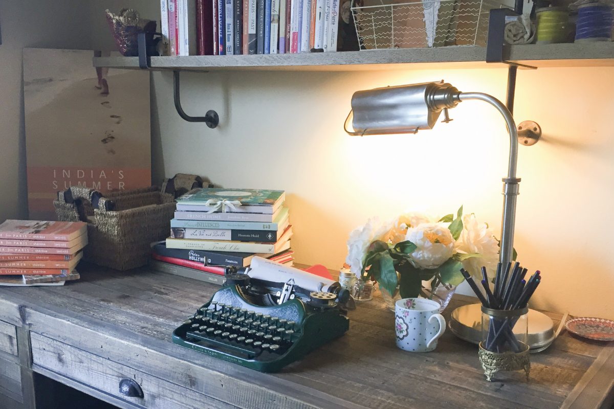 Lady Thérèse's desk with typewriter and stack of books.