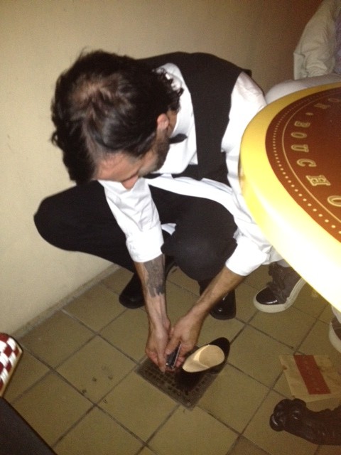 Saving the Louboutin from the grate!